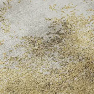 Photo of Gold And Beige Abstract Washable Area Rug With UV Protection