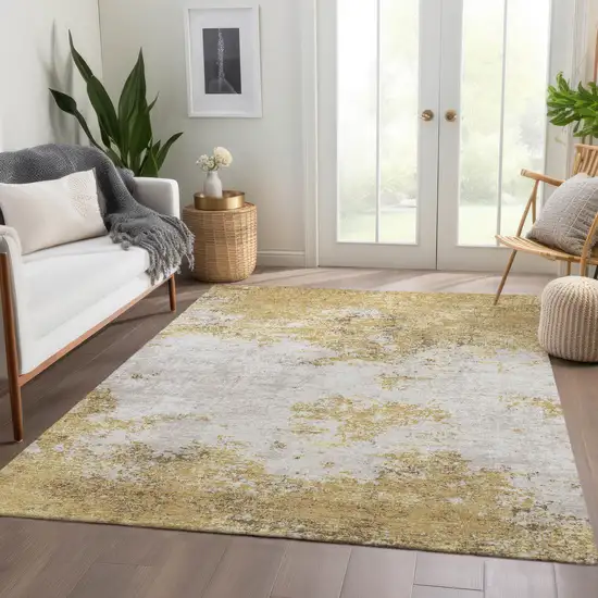 Gold And Beige Abstract Washable Area Rug With UV Protection Photo 4