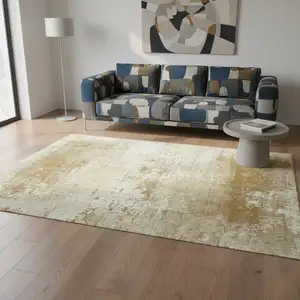 Photo of Gold And Beige Abstract Washable Area Rug With UV Protection