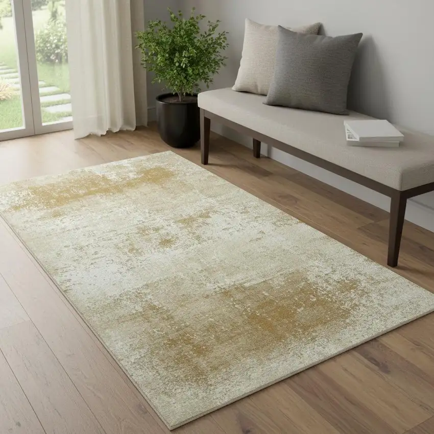 Gold And Beige Abstract Washable Area Rug With UV Protection Photo 1