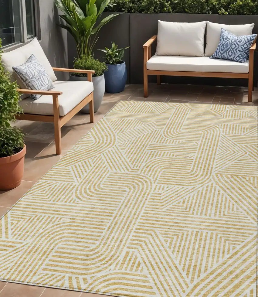 Gold And Beige Abstract Washable Indoor Outdoor Area Rug Photo 1