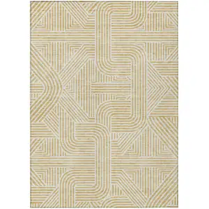 Photo of Gold And Beige Abstract Washable Indoor Outdoor Area Rug