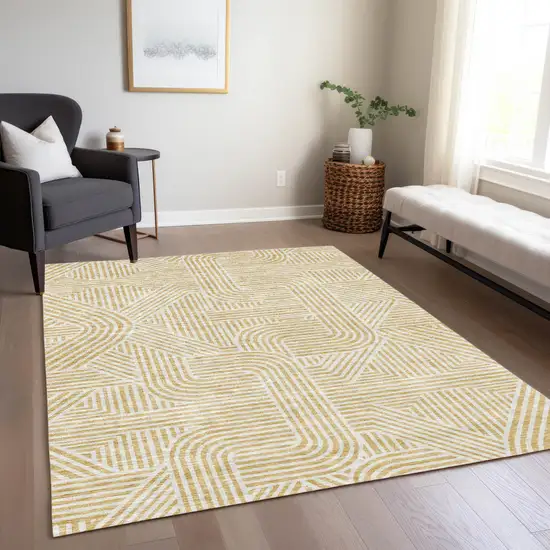 Gold And Beige Abstract Washable Indoor Outdoor Area Rug Photo 9
