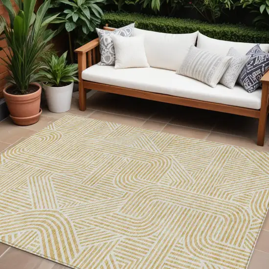 Gold And Beige Abstract Washable Indoor Outdoor Area Rug Photo 1