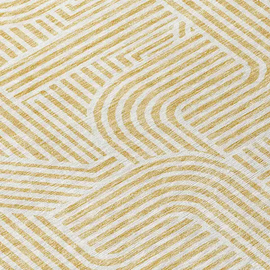 Gold And Beige Abstract Washable Indoor Outdoor Area Rug Photo 5