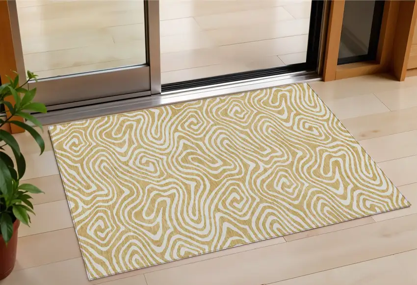 Gold And Beige Abstract Washable Indoor Outdoor Area Rug Photo 1