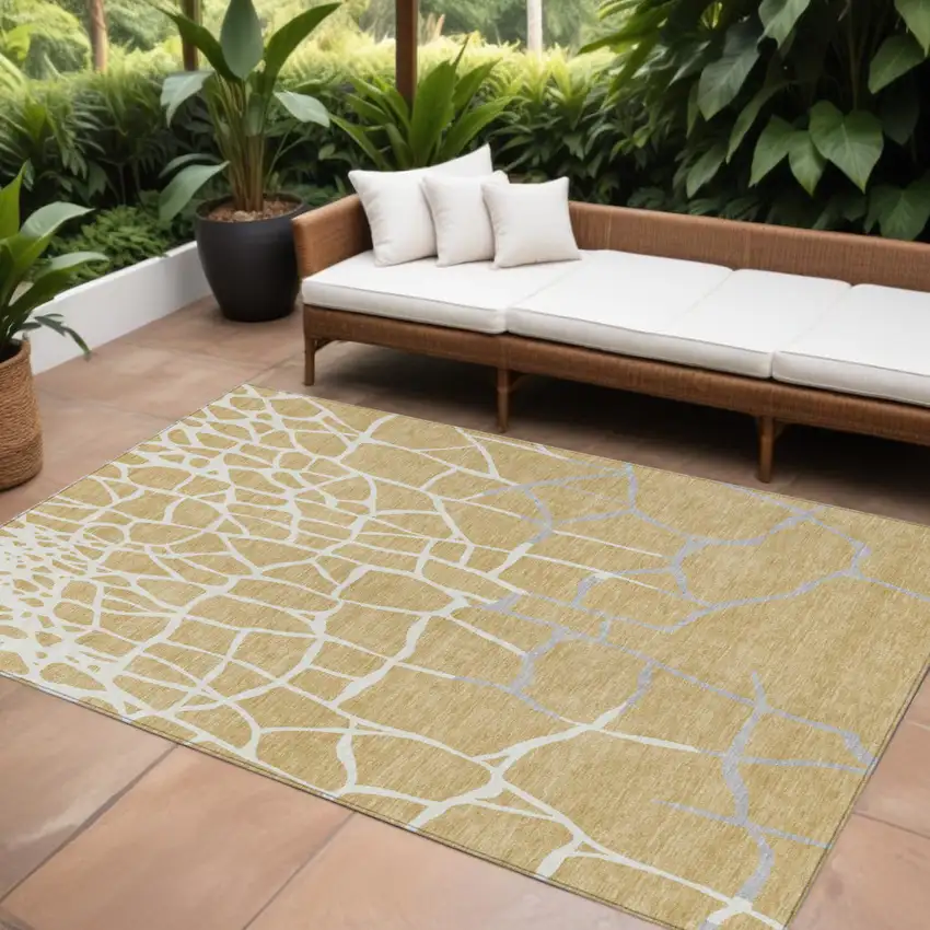 Gold And Beige Abstract Washable Indoor Outdoor Area Rug Photo 1