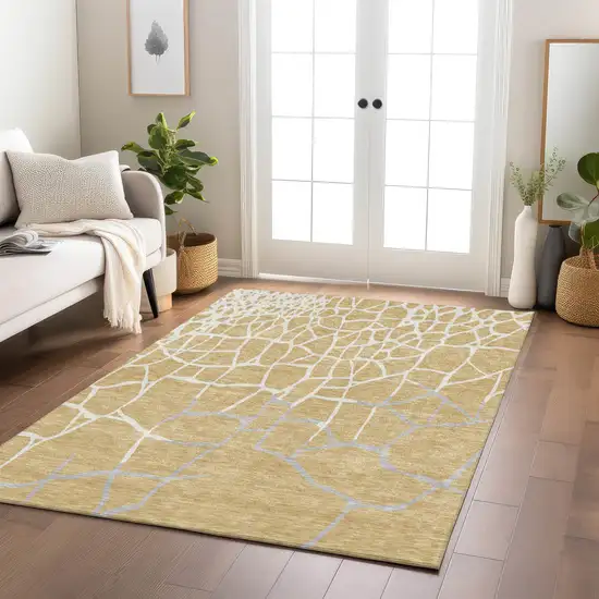 Gold And Beige Abstract Washable Indoor Outdoor Area Rug Photo 9