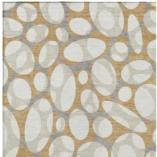 Gold And Beige Abstract Washable Indoor Outdoor Area Rug Photo 2