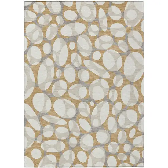 Gold And Beige Abstract Washable Indoor Outdoor Area Rug Photo 1