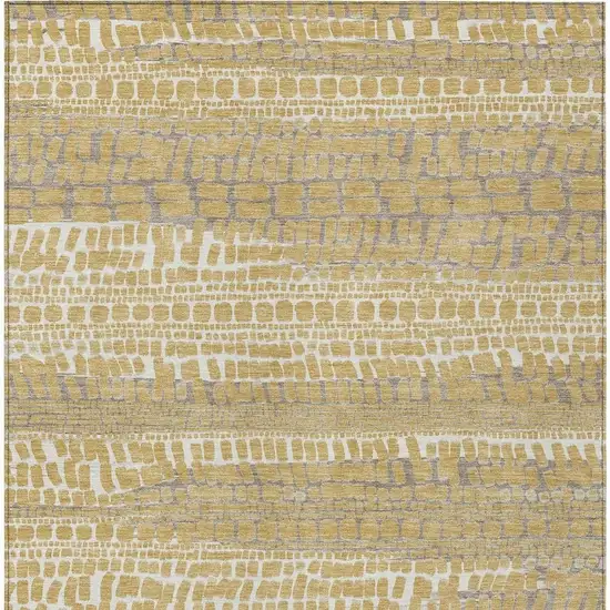 Gold And Beige Abstract Washable Indoor Outdoor Area Rug Photo 3