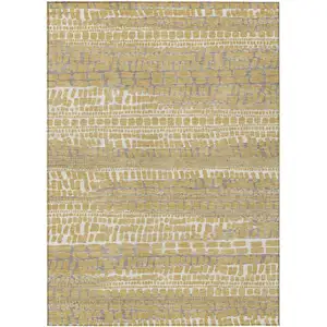 Photo of Gold And Beige Abstract Washable Indoor Outdoor Area Rug
