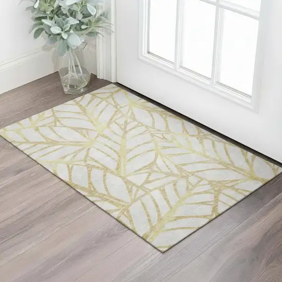 Gold And Beige Floral Washable Area Rug With UV Protection Photo 1