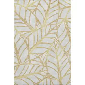 Photo of Gold And Beige Floral Washable Area Rug With UV Protection
