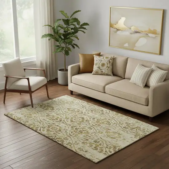 Gold And Beige Floral Washable Area Rug With UV Protection Photo 1