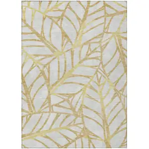 Photo of Gold And Beige Floral Washable Indoor Outdoor Area Rug