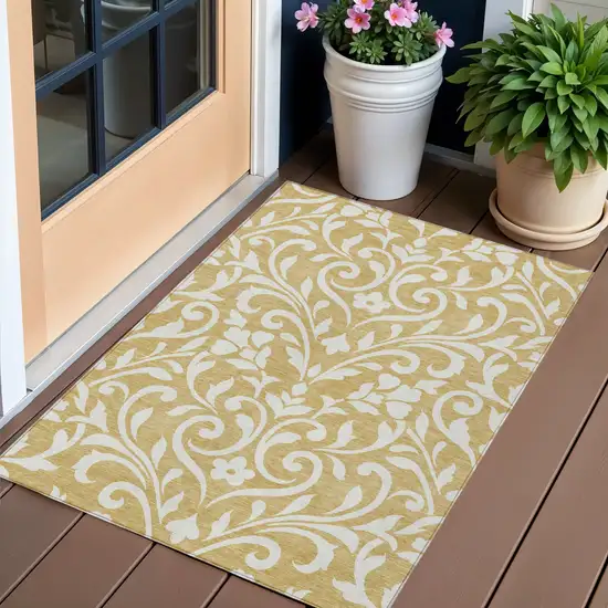 Gold And Beige Floral Washable Indoor Outdoor Area Rug Photo 1