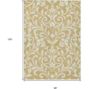Photo of Gold And Beige Floral Washable Indoor Outdoor Area Rug
