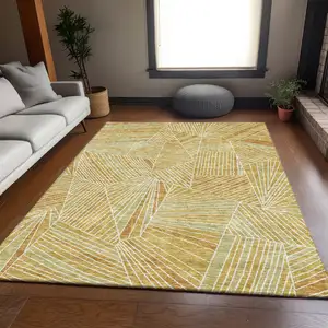 Photo of Gold And Beige Geometric Washable Area Rug With UV Protection