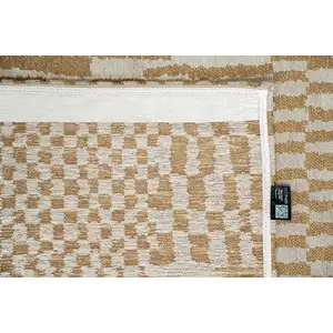 Photo of Gold And Beige Geometric Washable Area Rug With UV Protection