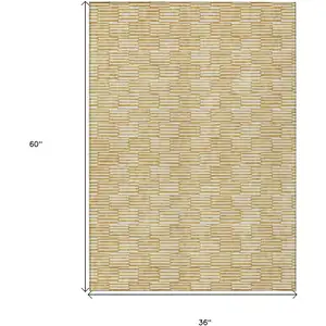 Photo of Gold And Beige Geometric Washable Indoor Outdoor Area Rug