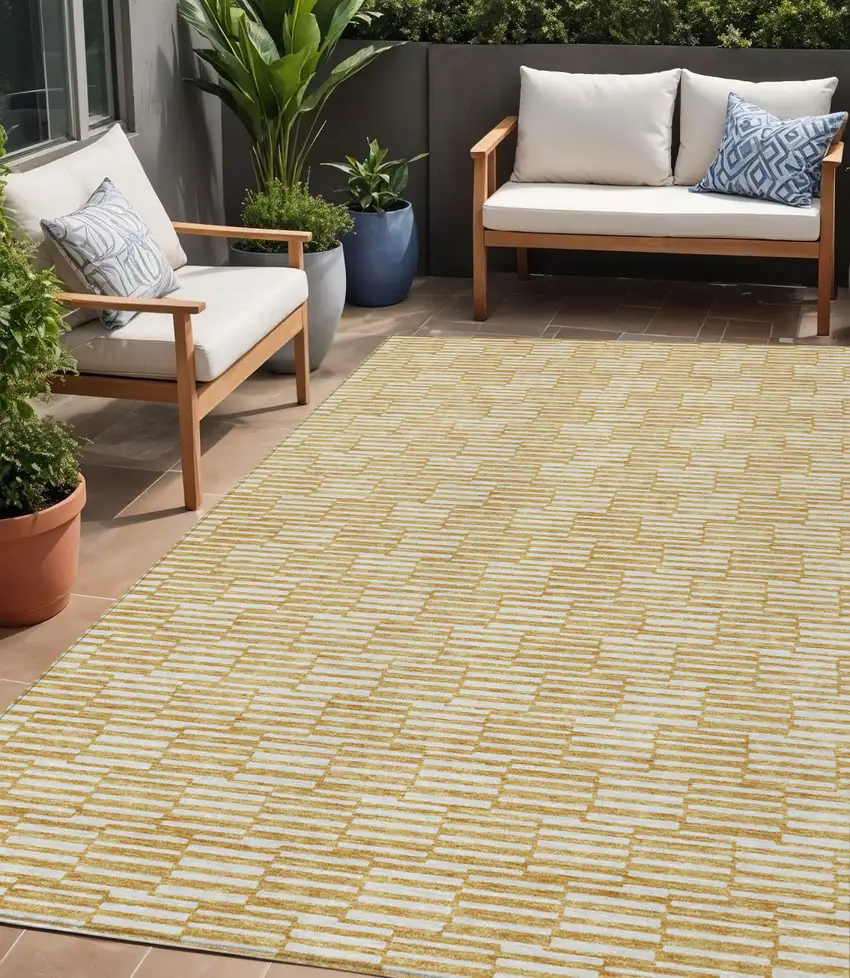 Gold And Beige Geometric Washable Indoor Outdoor Area Rug Photo 1