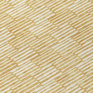Photo of Gold And Beige Geometric Washable Indoor Outdoor Area Rug