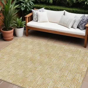 Photo of Gold And Beige Geometric Washable Indoor Outdoor Area Rug