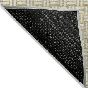 Photo of Gold And Beige Geometric Washable Indoor Outdoor Area Rug