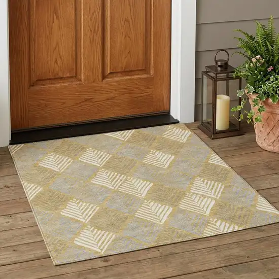 Gold And Beige Geometric Washable Indoor Outdoor Area Rug Photo 1
