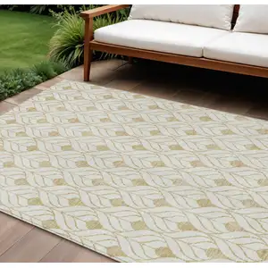 Photo of Gold And Beige Geometric Washable Indoor Outdoor Area Rug