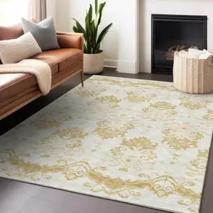 Photo of Gold And Beige Medallion Washable Area Rug With UV Protection