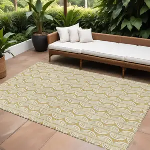 Photo of Gold And Beige Ogee Washable Indoor Outdoor Area Rug