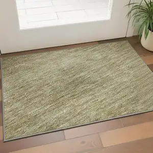 Photo of Gold And Beige Ombre Washable Area Rug With UV Protection