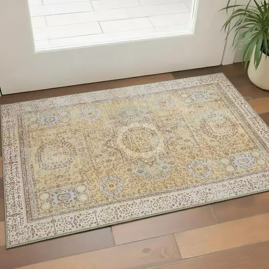 Gold And Beige Oriental Washable Area Rug With UV Protection Photo 2