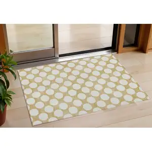 Photo of Gold And Beige Polka Dot Washable Indoor Outdoor Area Rug