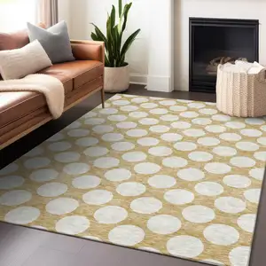 Photo of Gold And Beige Polka Dot Washable Indoor Outdoor Area Rug