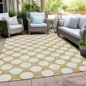 Photo of Gold And Beige Polka Dot Washable Indoor Outdoor Area Rug