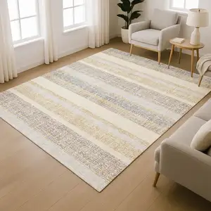 Photo of Gold And Beige Striped Washable Area Rug With UV Protection