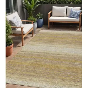 Photo of Gold And Beige Striped Washable Indoor Outdoor Area Rug