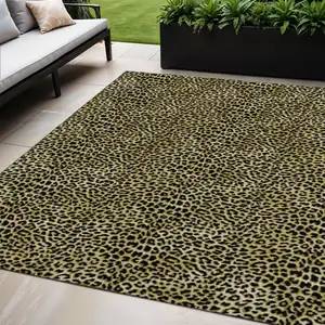 Photo of Gold And Black Leopard Print Washable Indoor Outdoor Area Rug