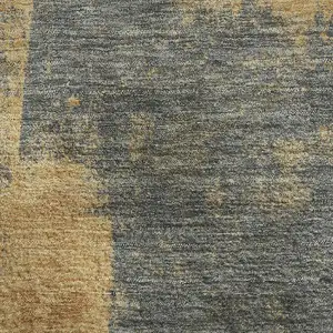 Photo of Gold And Blue Abstract Washable Area Rug With UV Protection