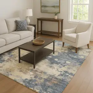 Photo of Gold And Blue Abstract Washable Area Rug With UV Protection