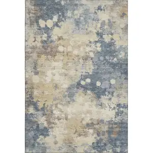 Photo of Gold And Blue Abstract Washable Area Rug With UV Protection