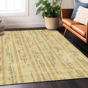 Photo of Gold And Brown Striped Washable Indoor Outdoor Area Rug