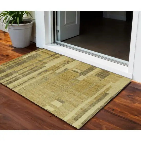 Gold And Dark Brown Striped Washable Indoor Outdoor Area Rug Photo 1