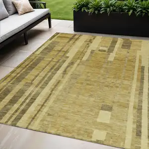 Photo of Gold And Dark Brown Striped Washable Indoor Outdoor Area Rug