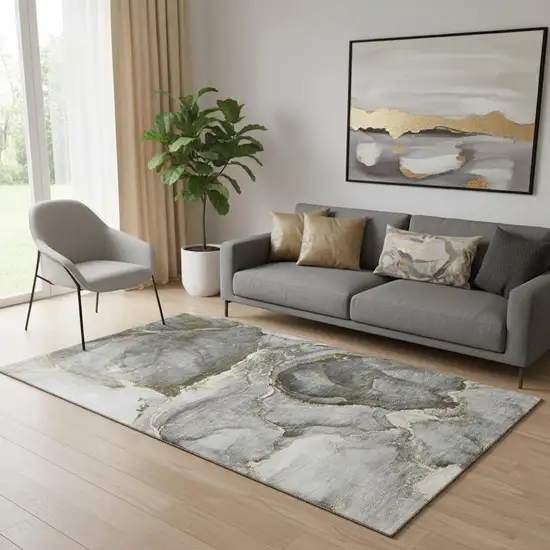 Gold And Gray Abstract Washable Area Rug With UV Protection Photo 1