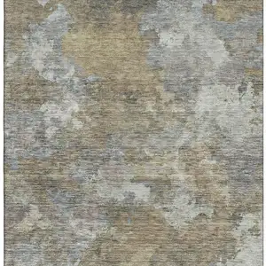 Photo of Gold And Gray Abstract Washable Area Rug With UV Protection