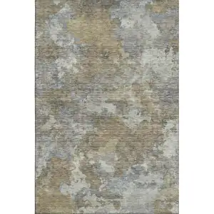 Photo of Gold And Gray Abstract Washable Area Rug With UV Protection